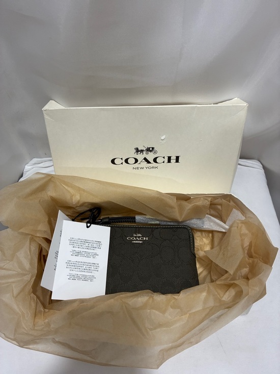 Coach Handbags - Coach Black Signature Zip Wristlet NWT
